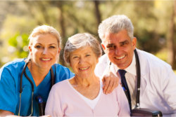 medical staff and patient smiling